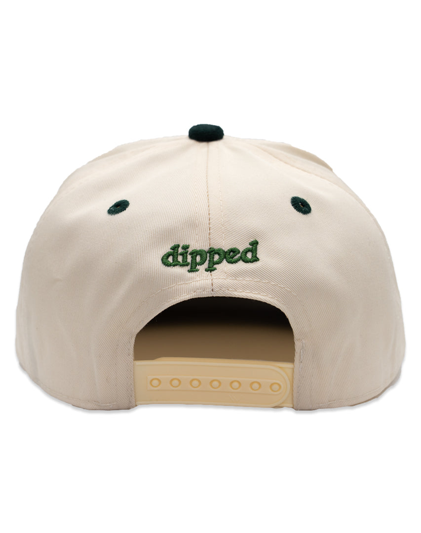 Two-tone snapback with 'Enjoy the Trip' puff embroidered on it