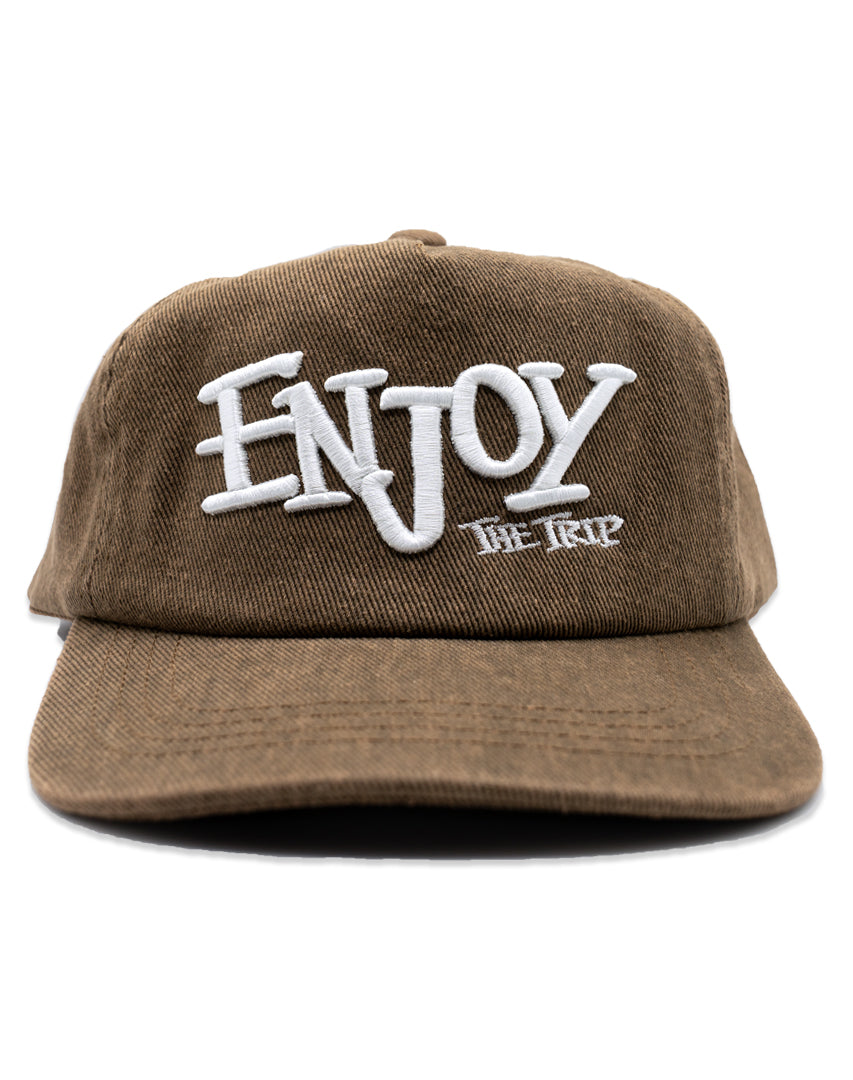 Khaki Washed Denim hat with white embroidery 'ENJOY THE TRIP' on a white background